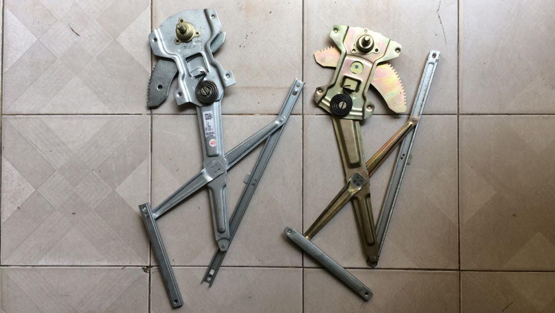 Compa lên xuống kính trước Sym T880