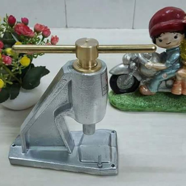 Máy xam đóng nút bọc vải