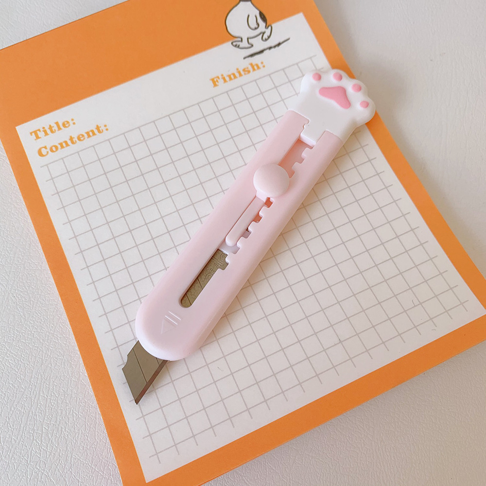 Cute and compact cloud-shaped paper cutter with self-retracting blade, safe and convenient