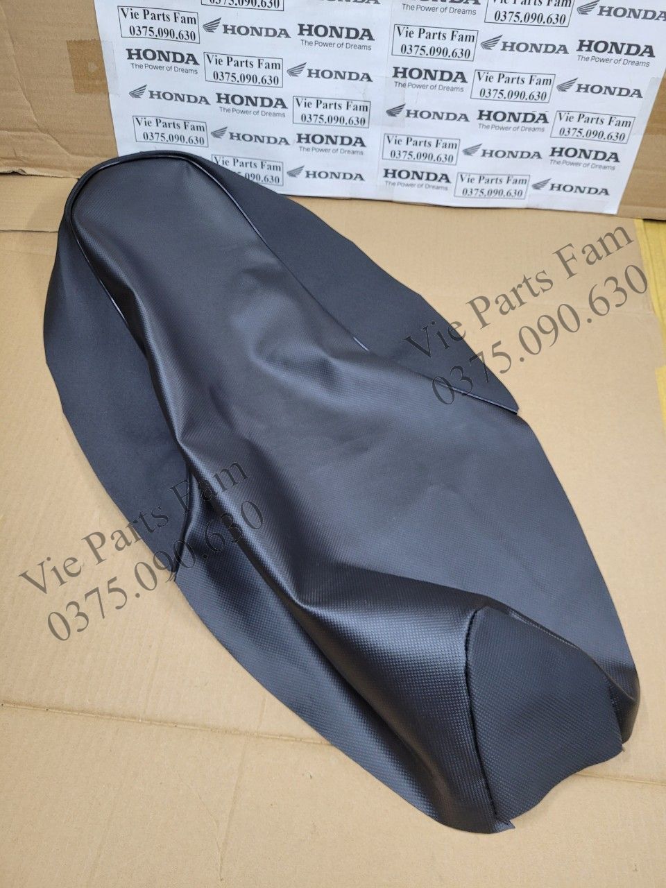 Da bọc yên (vỏ yên) Wave S110 (hàng tốt)