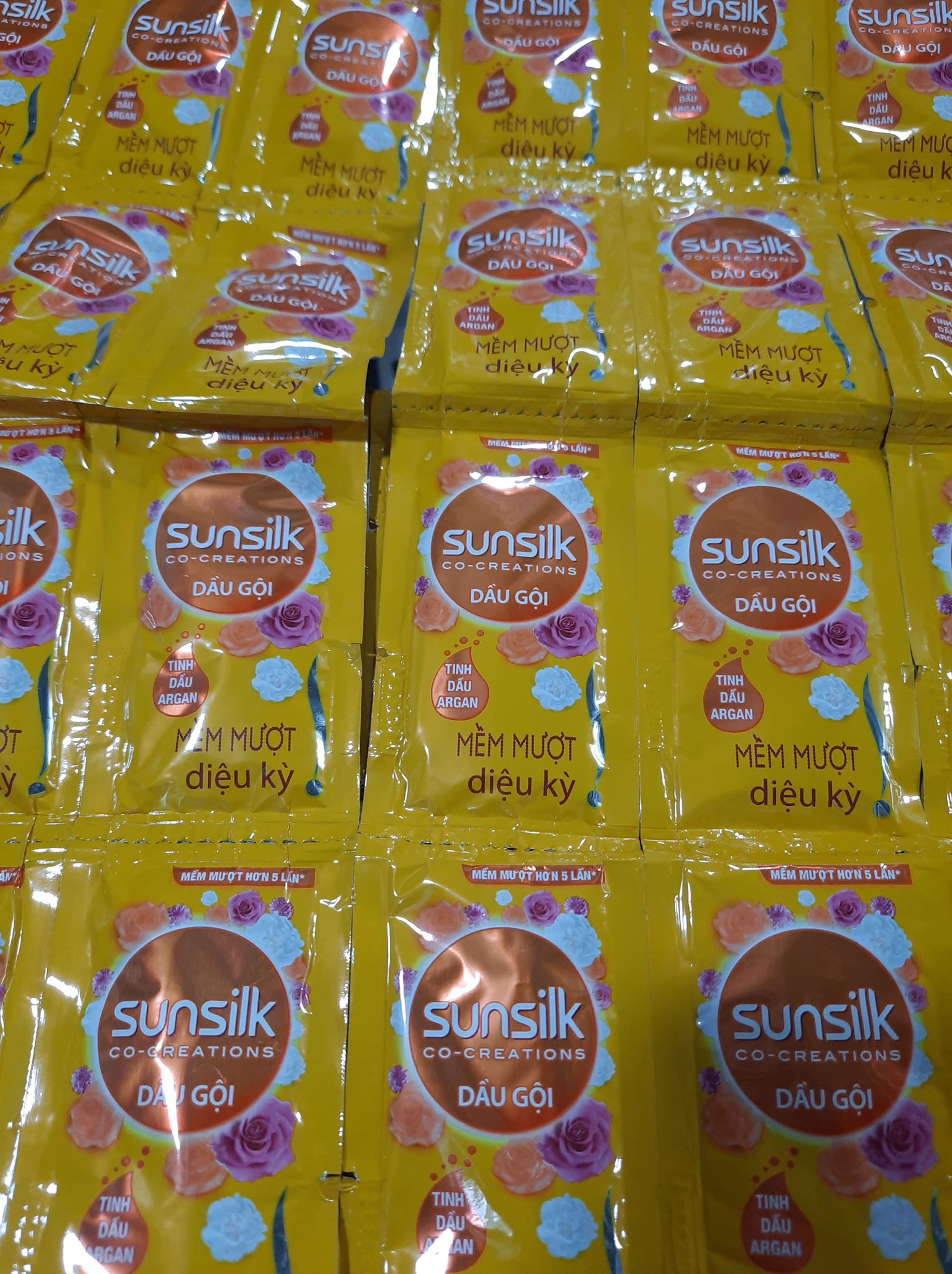 dây gội sunsilk 12 gói màu vàng