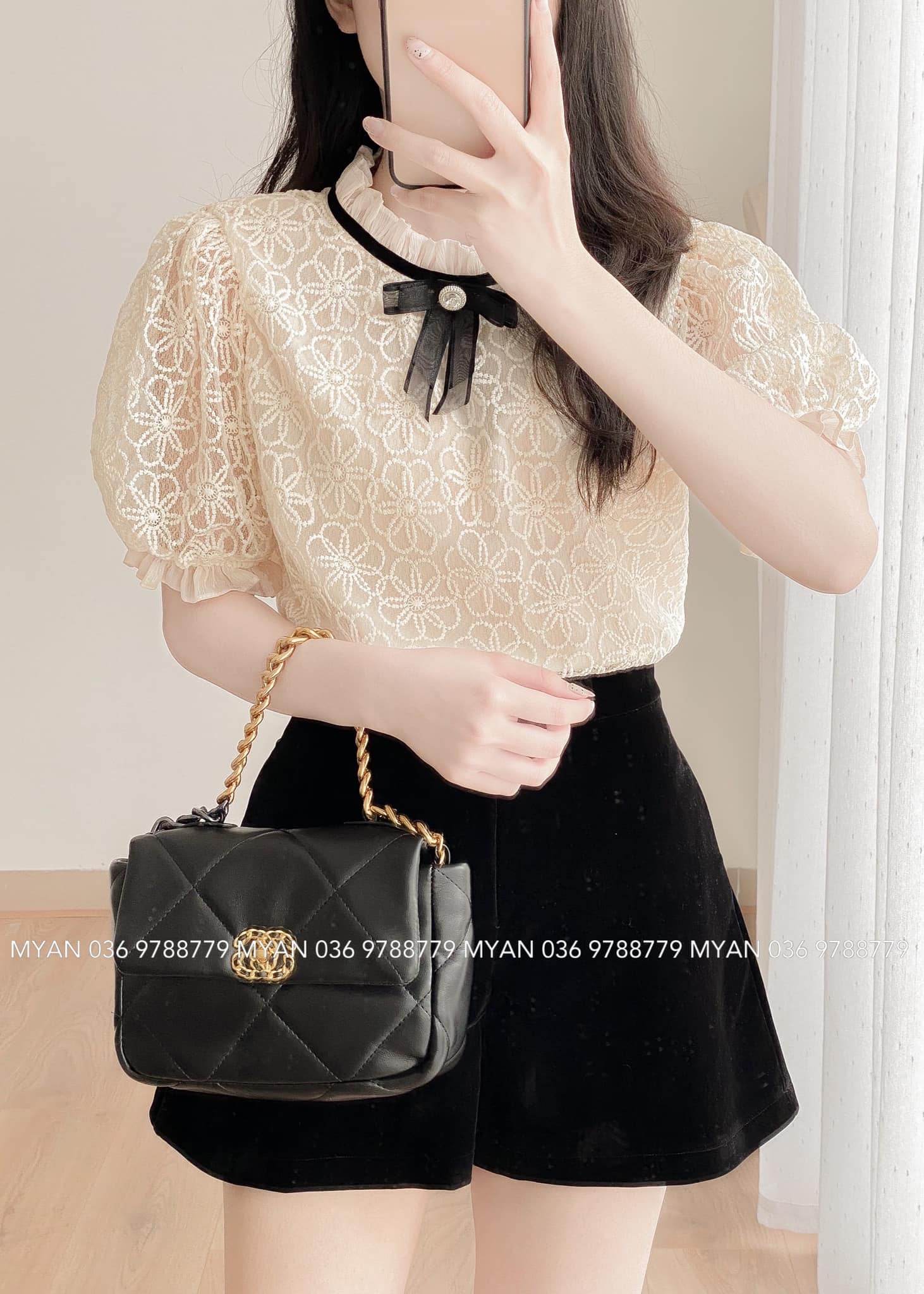 Quần short nhung myan thiết kế quần short ống rộng khuy lệch cạp cao màu đen qvn012201