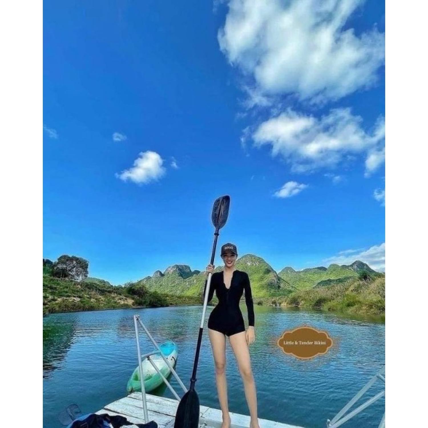 Jump nữ bikini màu đen tay dài
