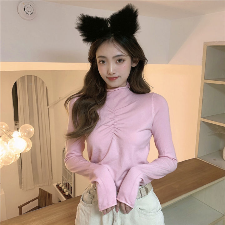 turtleneck peplum top