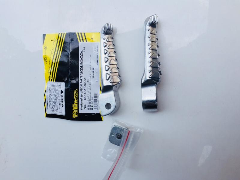 Gác chân cá xấu bật bi cho xe máy honda