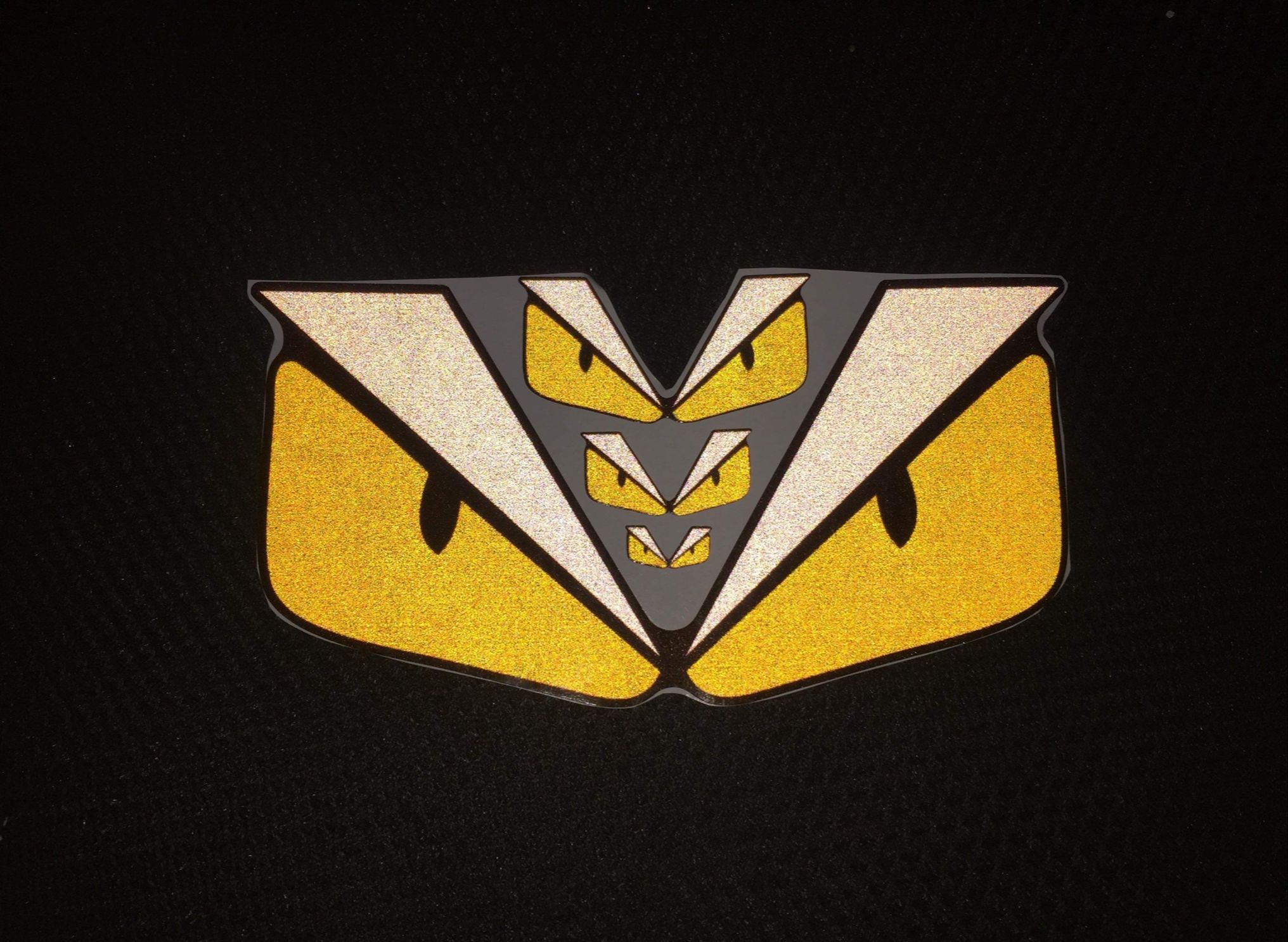 2 tem mắt khủng long phản quang kich thuoc 8x15cm