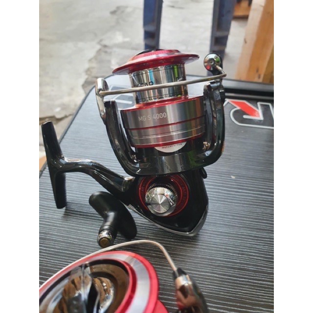 máy câu DAIWA MG S 4000 máy cực khoẻ .  (cam kết đổi trả trong 2 tuần đầu)