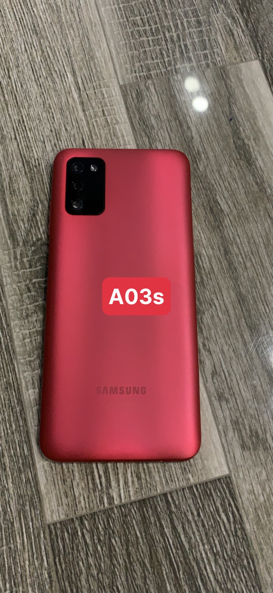 bộ vỏ samsung A03S (gồm,sườn,lưng,kính cam, nút bấn)