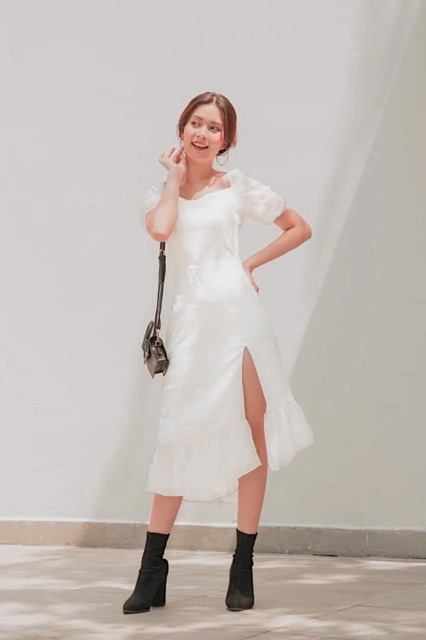 Đầm trắng đuôi cá xẻ tà