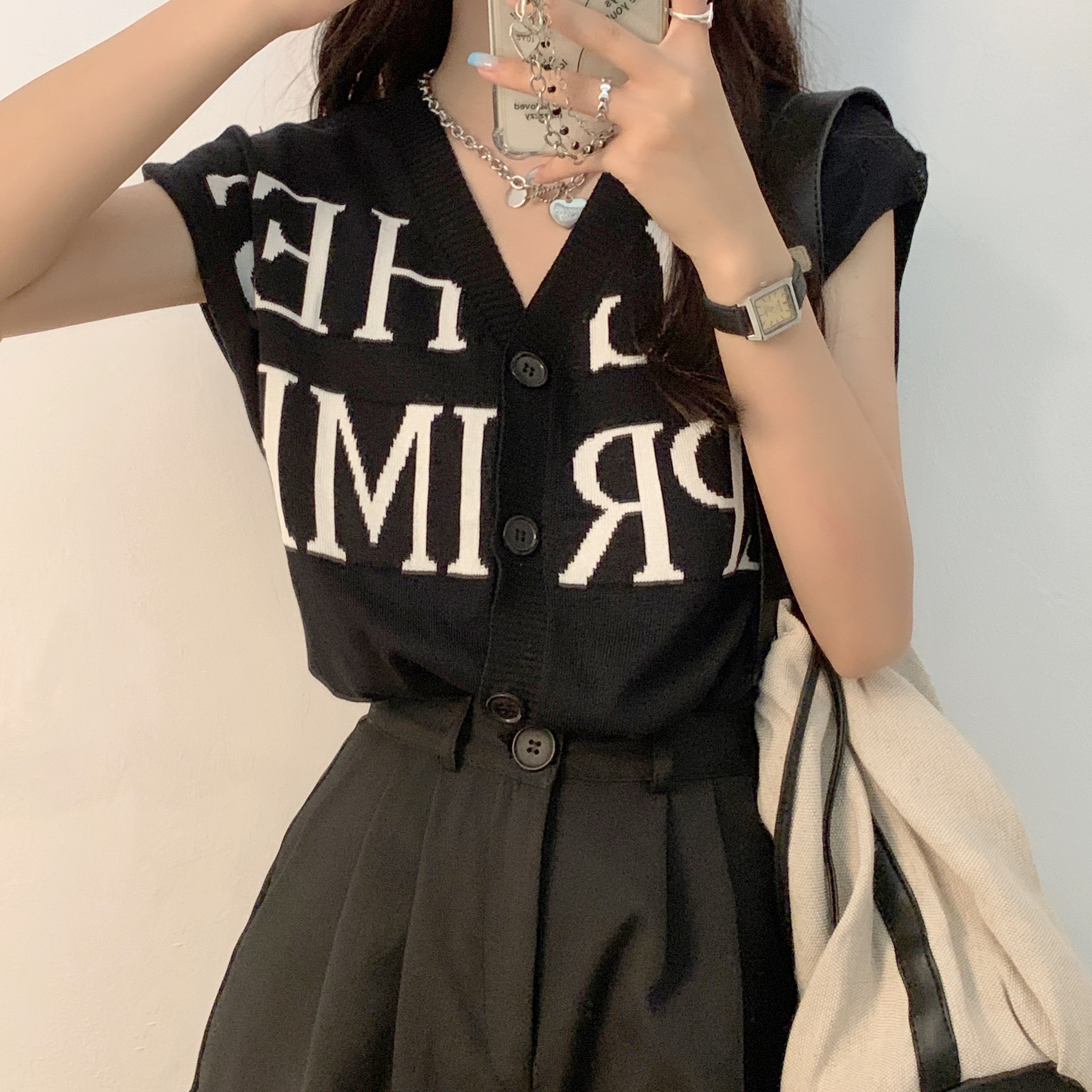 Áo len dệt kim ngắn tay nữ