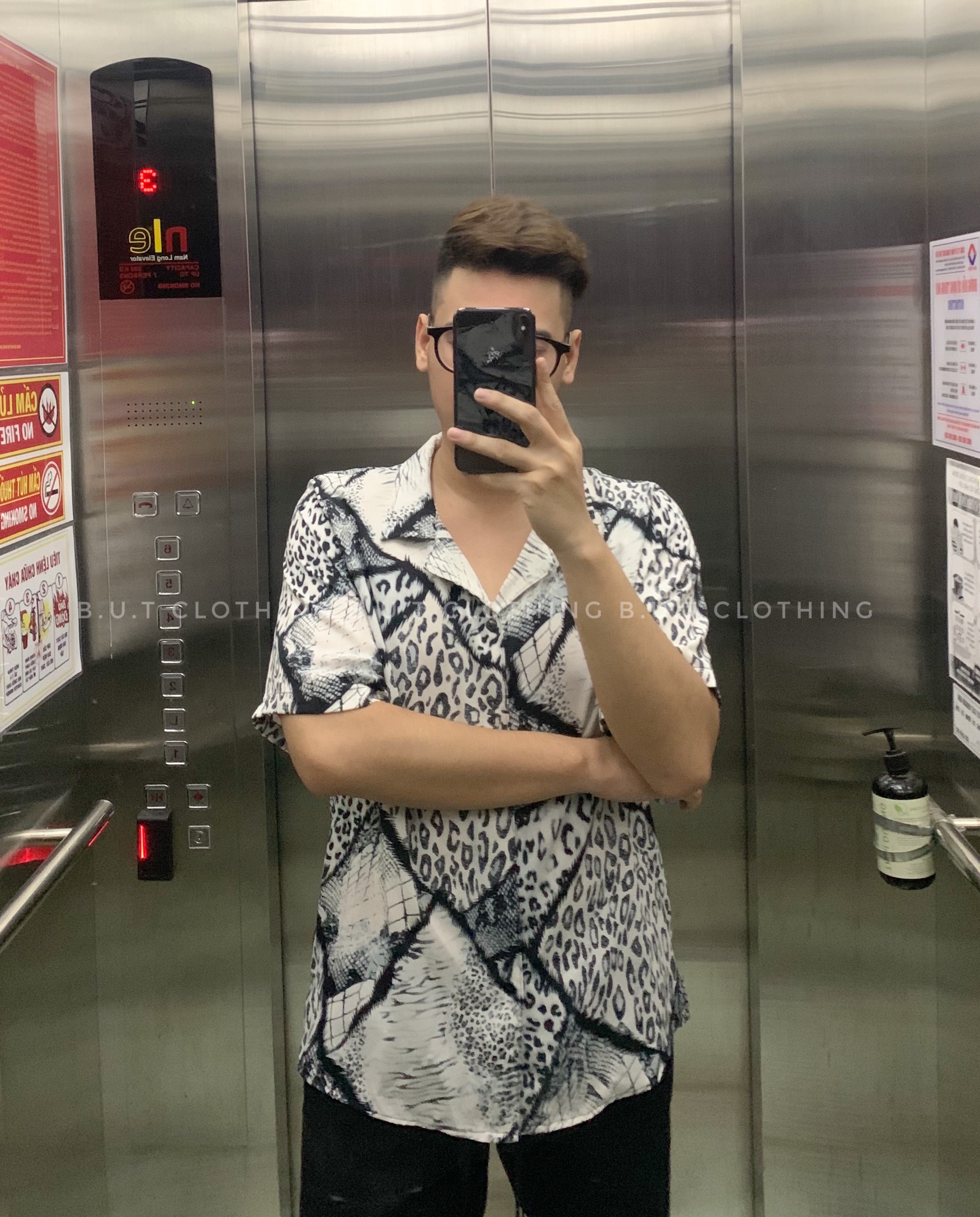 Sơ mi cộc tay da beo trắng