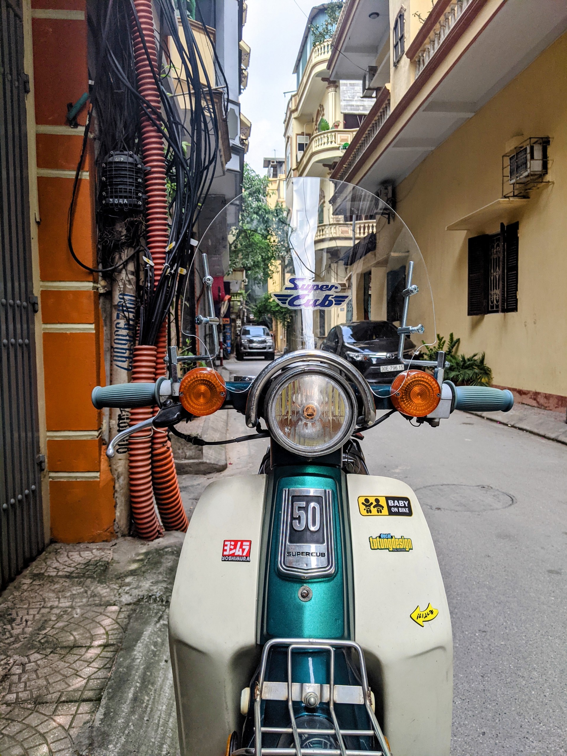 Kính chắn gió xe cub đèn tròn Asahi