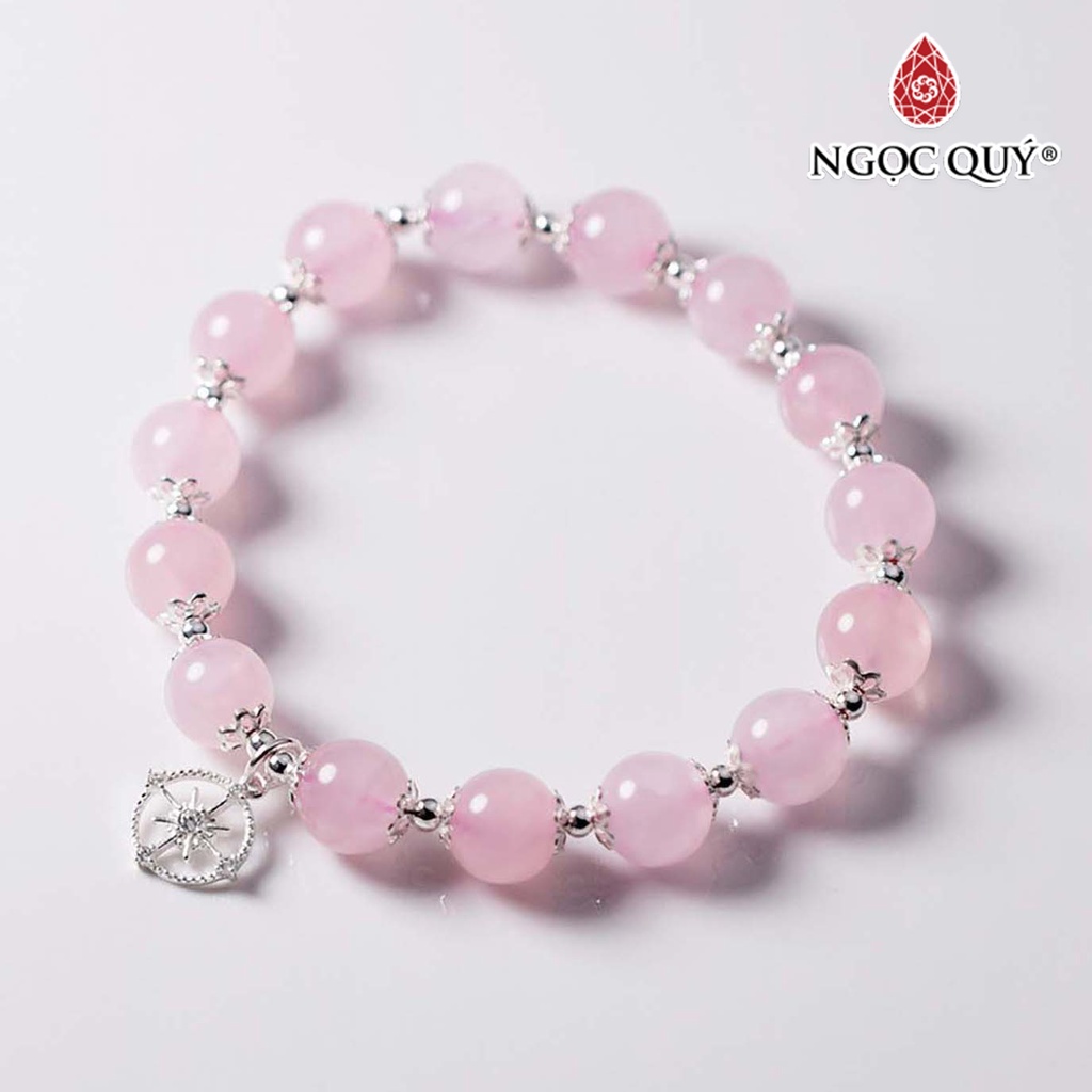 Vòng tay thạch anh hồng phối charm bánh xe - ngọc quý