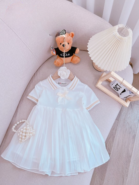 Váy bé gái xếp li 2 lớp nơ