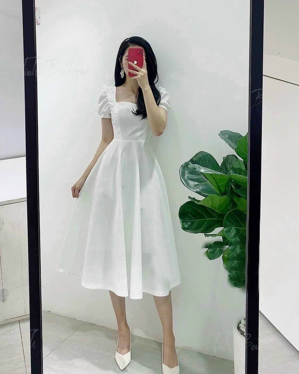 Đầm trắng cổ vuông nơ sau