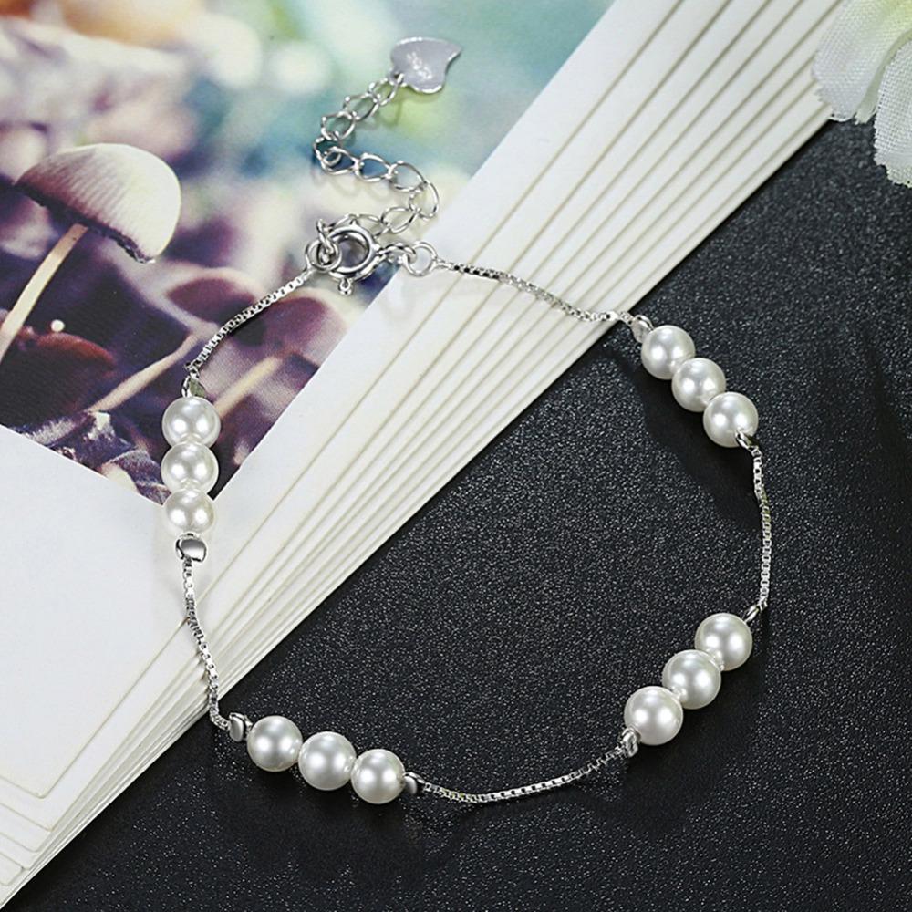 lắc bạc phối ngọc trai thật style cá tính