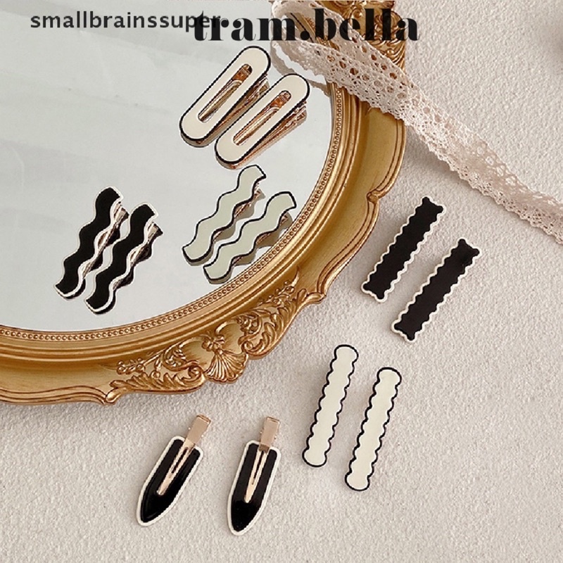 set 2 Kẹp tóc càng cua hình thật đen trắng