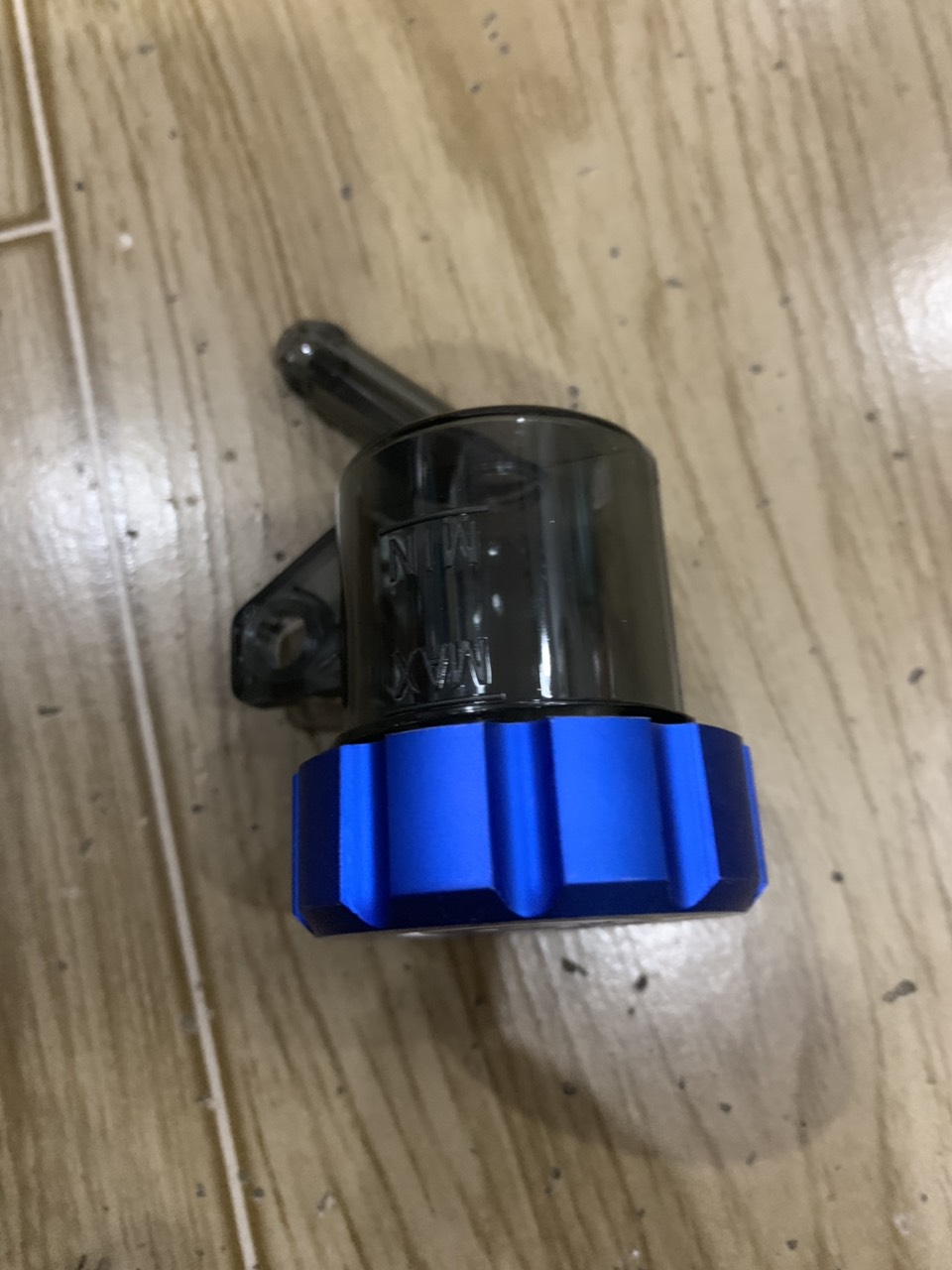 bình dầu brembo màu xanh