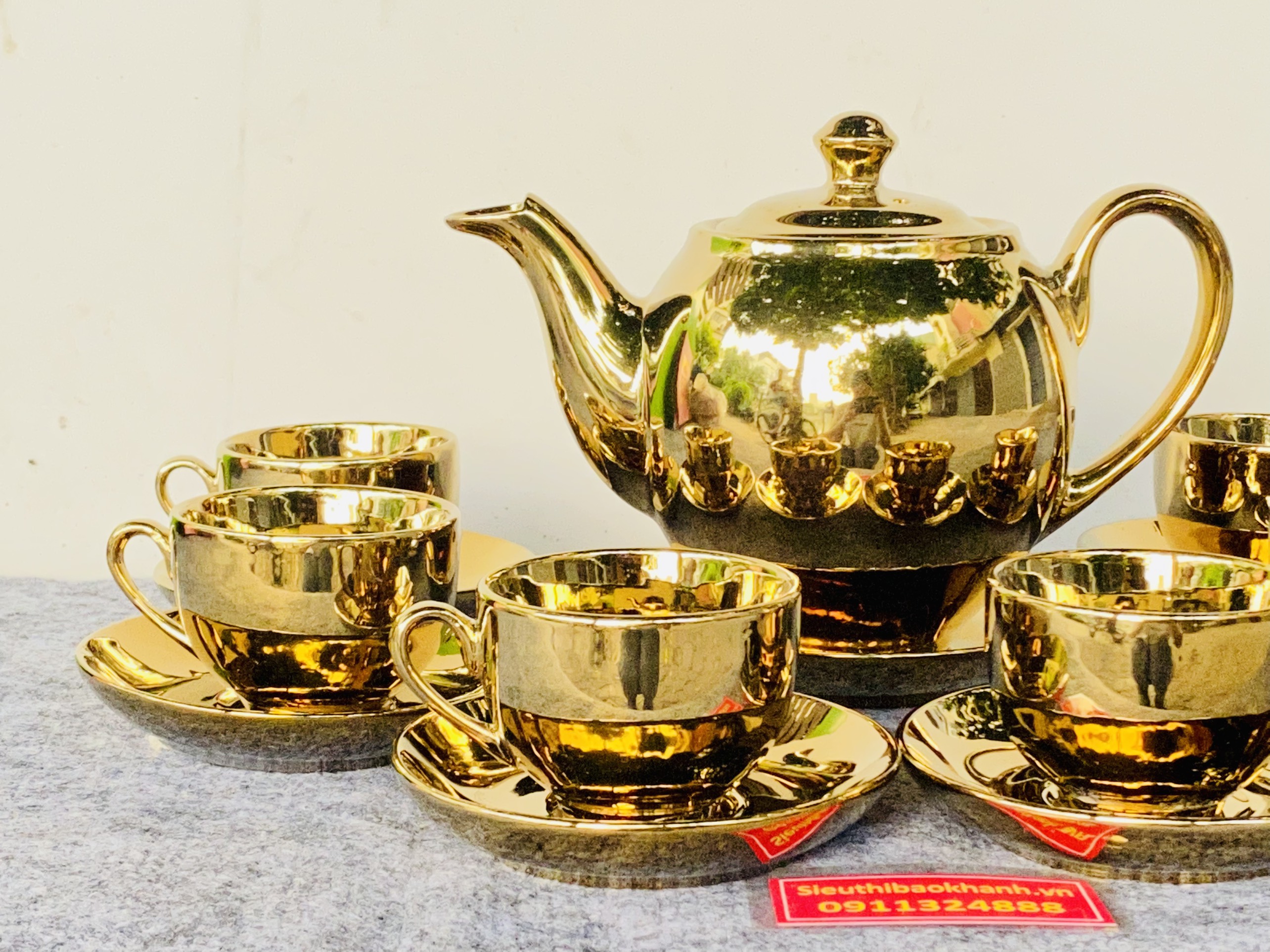 Bộ ấm chén gốm sứ dát vàng cao cấp