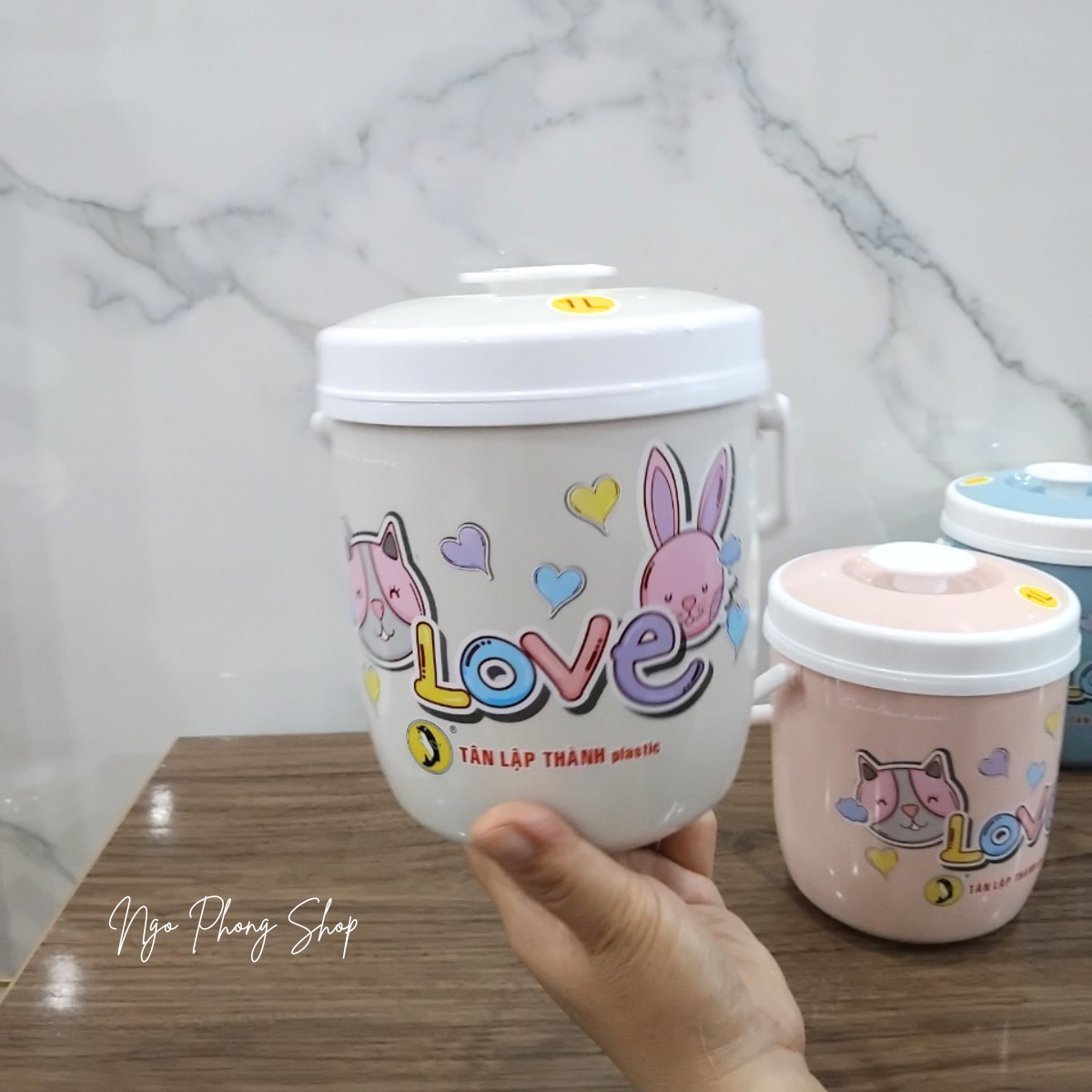 Bình đá tròn 1L Tân Lập Thành. Bình đá mini nhỏ gọn, quai xách chắc chắn, giữ lạnh lâu.