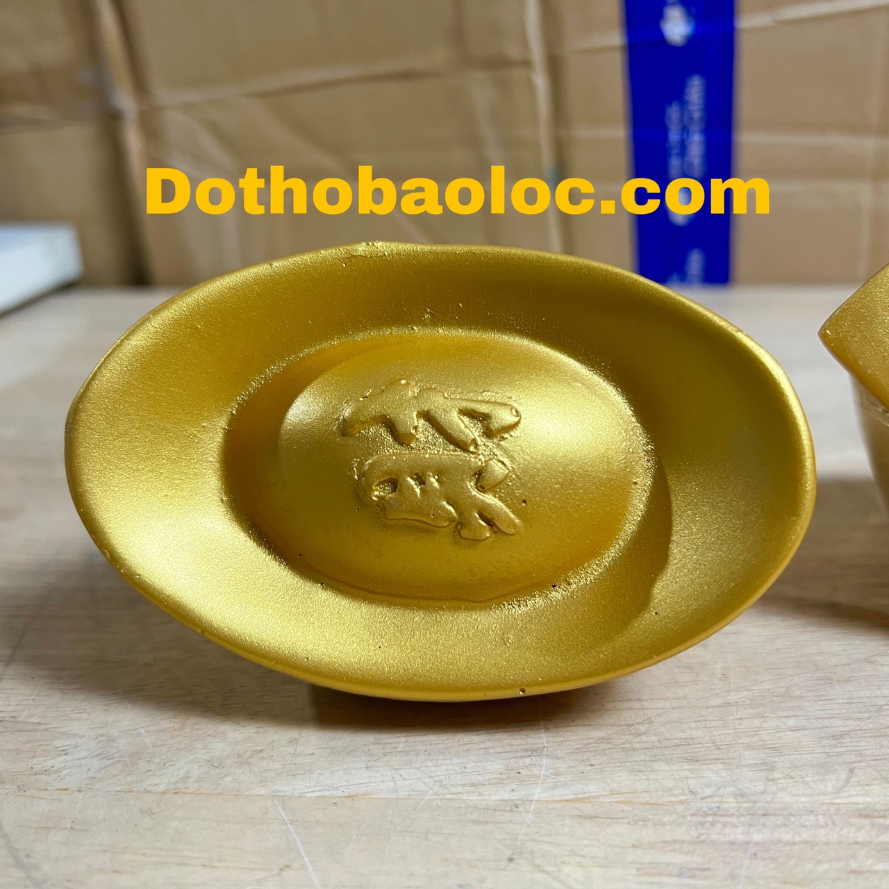 Thỏi vàng, quạt tượng di lặc bằng bột đá