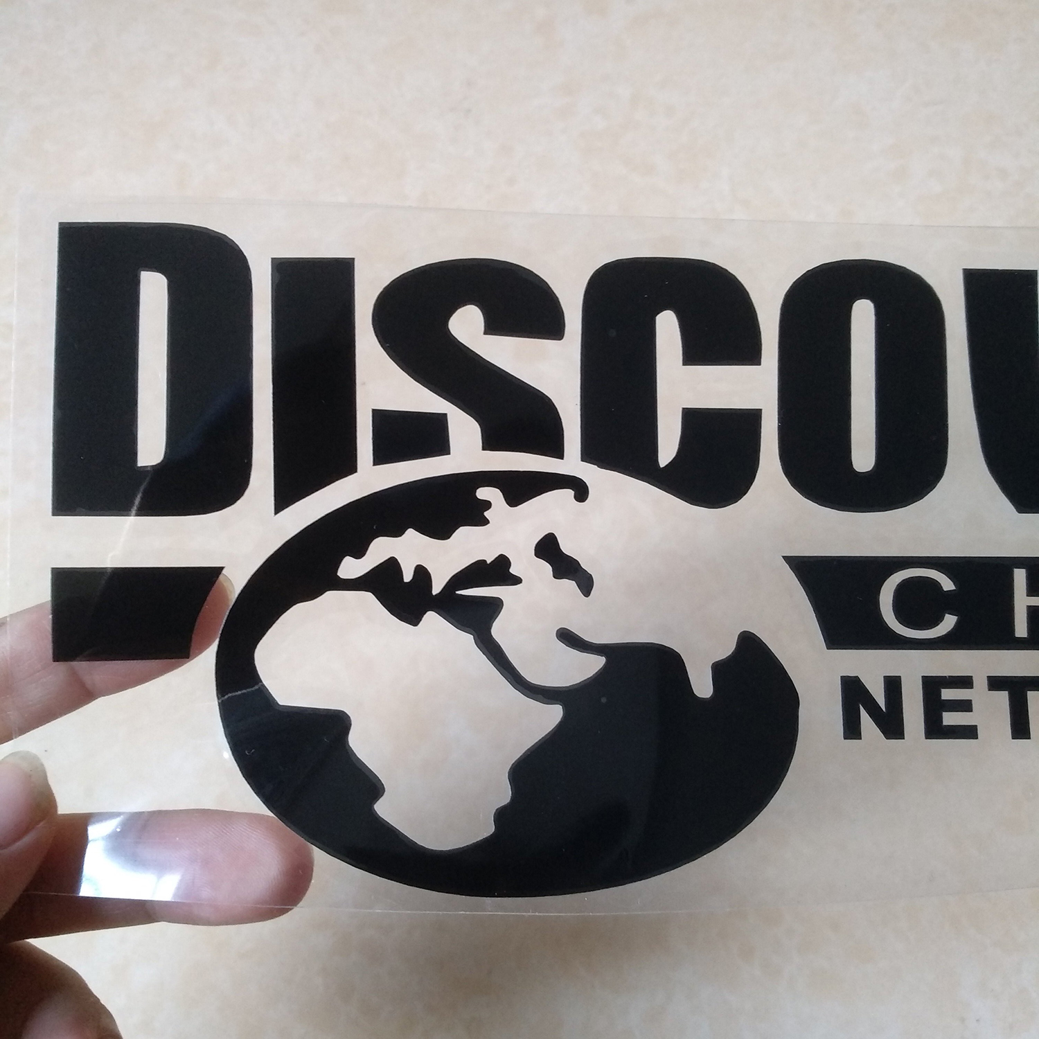 Decal dán DISCOVERY CHANNEL loại nhỏ ( Kích thước 25cm x 9.5cm )