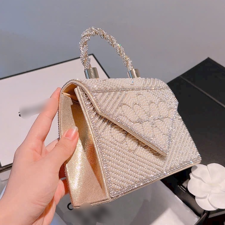 Clutch nữ nạm đá quai xoắn bling bling