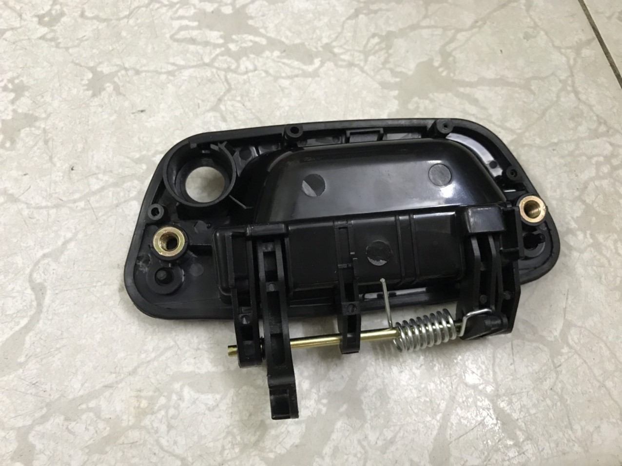 Tay mở cửa ngoài Chevrolet Spark 2012-