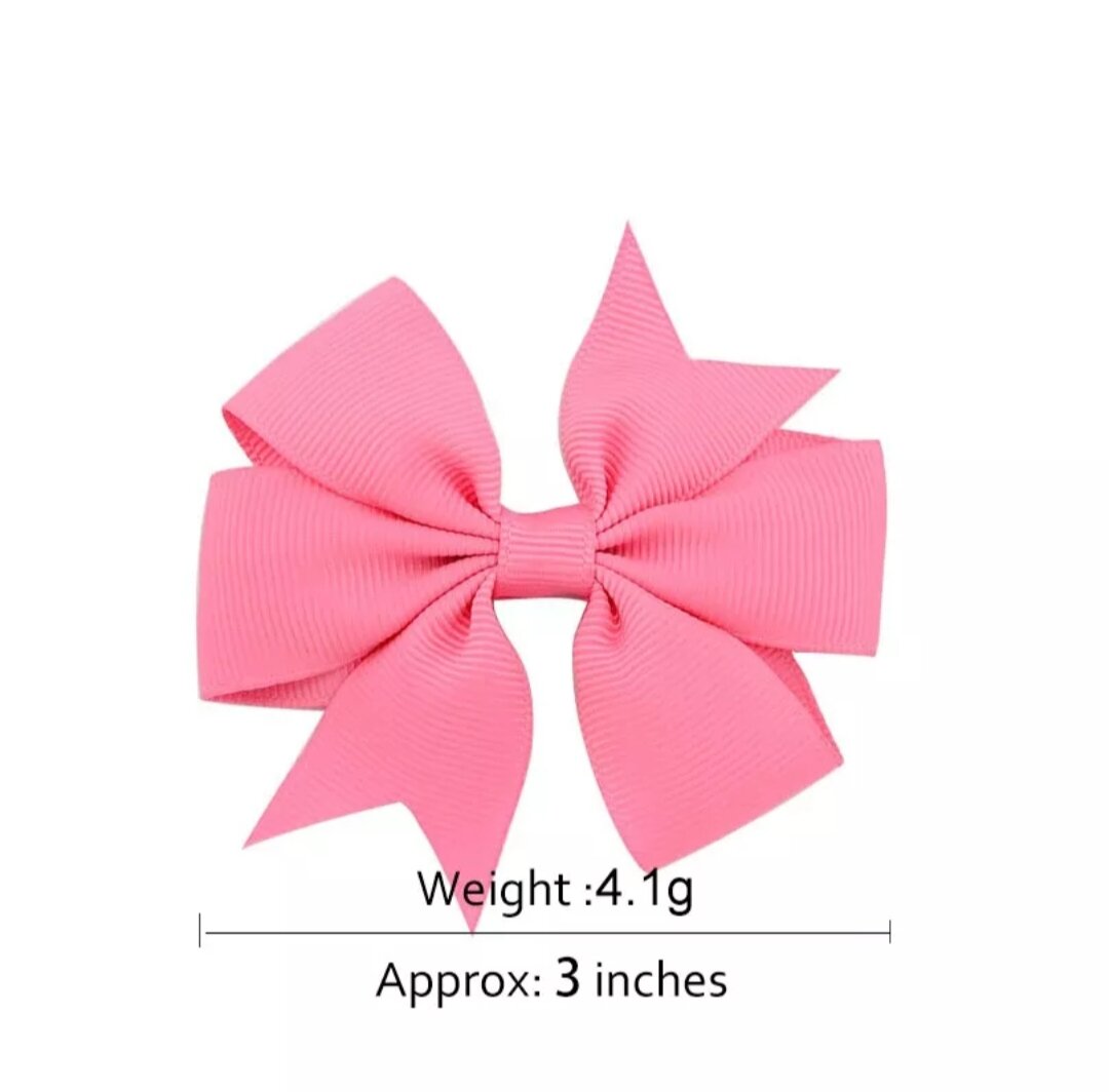 Kẹp tóc nơ 4 cánh cho bé