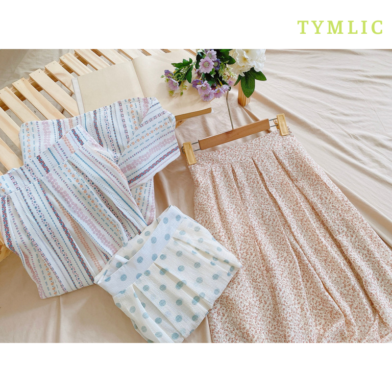 Chân váy midi họa tiết xếp ly TYMLIC