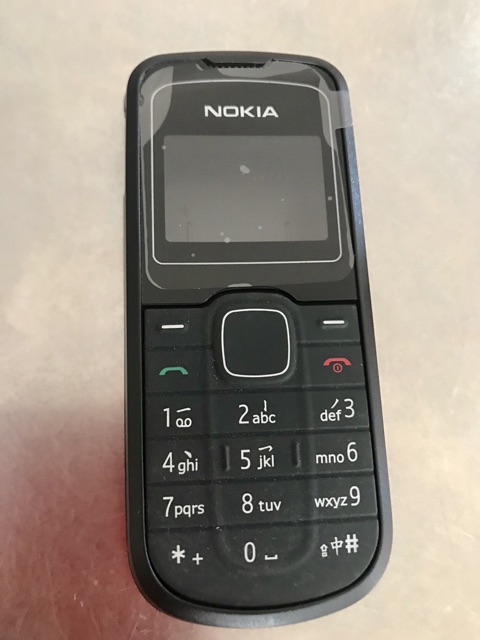 Combo:Bộ vỏ ,phím xịn : Nokia 1202 (phím xài không trầy )