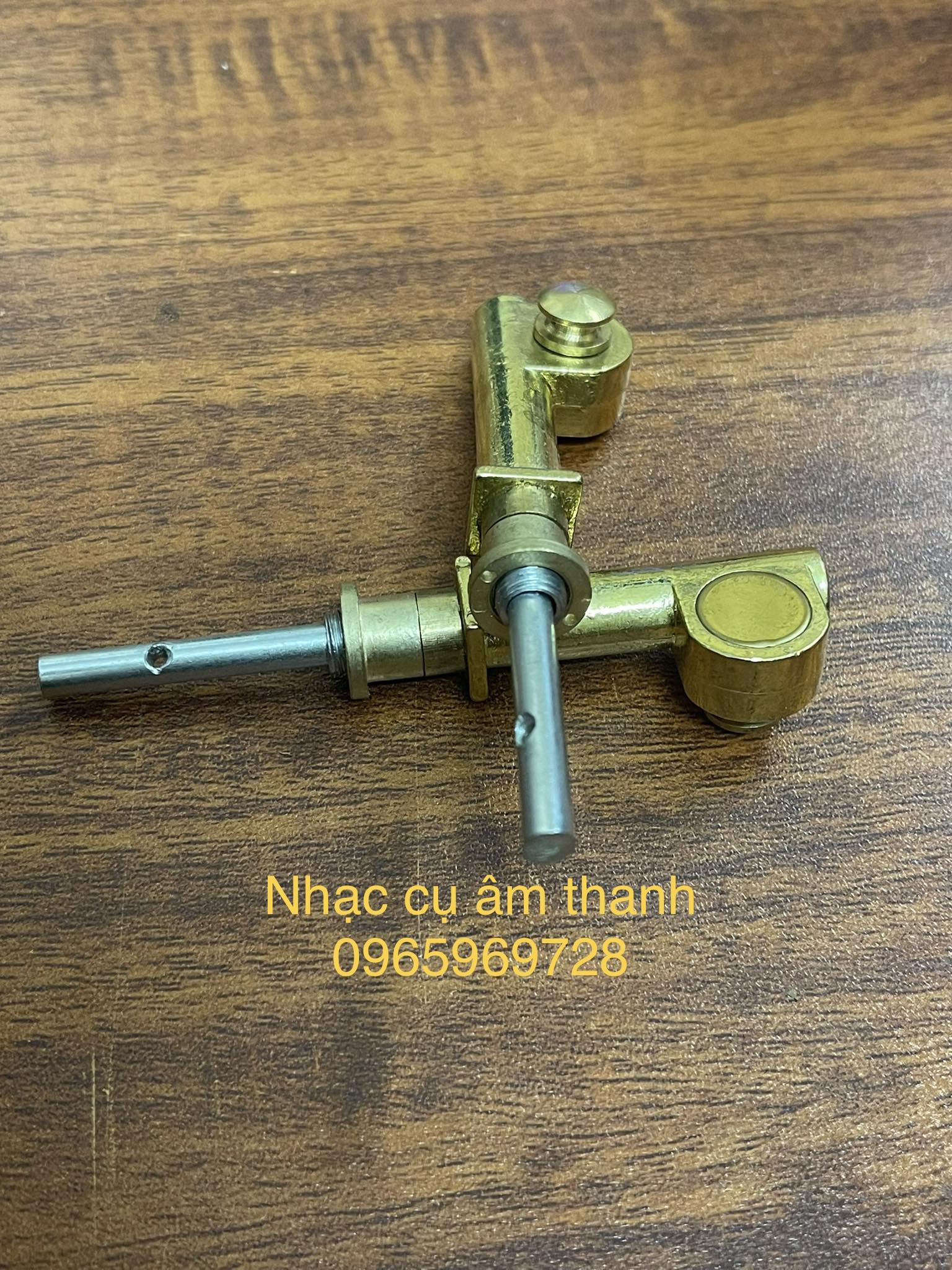 Tay nắm và trục khóa đồng đàn nhị