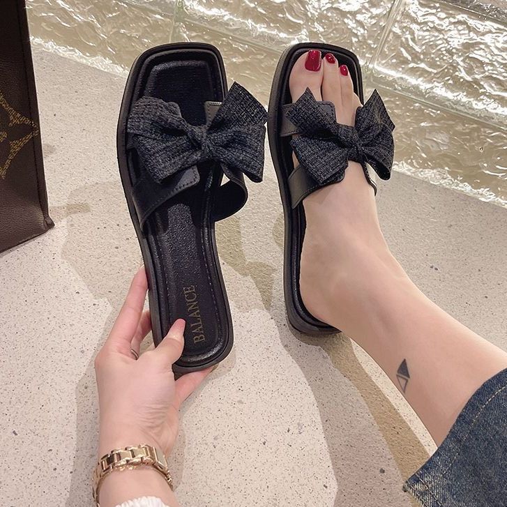 [HCM] Dép quai ngang nữ chữ H đính nơ iDEP DL057, dép lê nữ đế bệt sành điệu thời trang (Đen, Trắng)