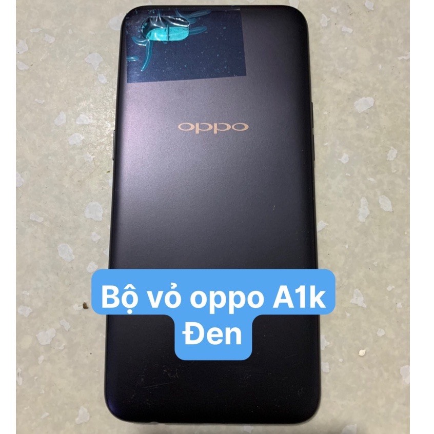 Bộ vỏ oppo A1k new zin - ( gồm lưng, sườn, phím, kính camera)