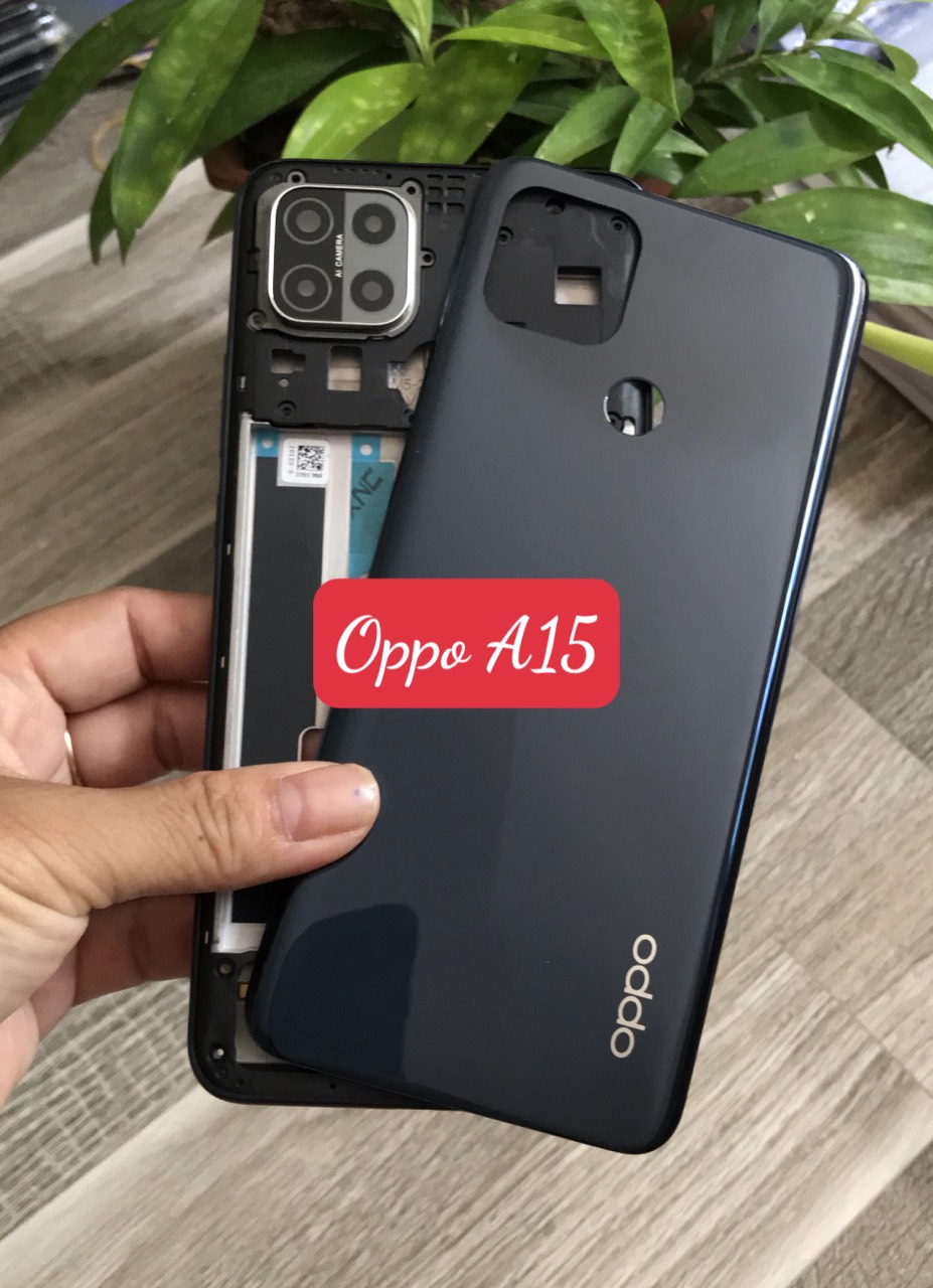 Bộ vỏ oppo A15 / A15s zin  (gồm lưng ,xương ,phím bấm,kính camera )