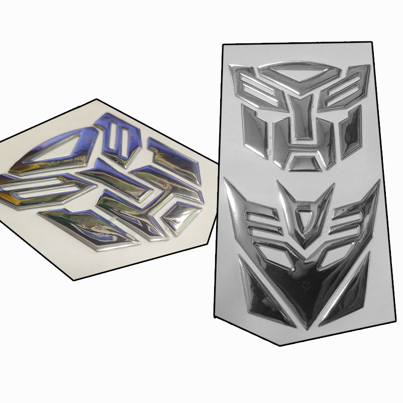 Bộ 2 Tem Dán Mặt Nạ Xe Máy đầu tranfomer 3d nổi (màu bạc)