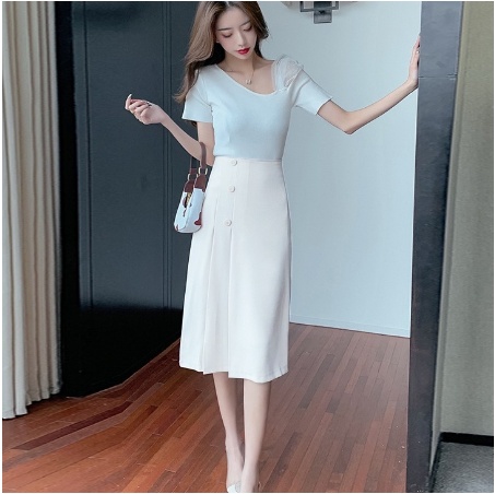 Chân váy xếp ly dài lệch tà