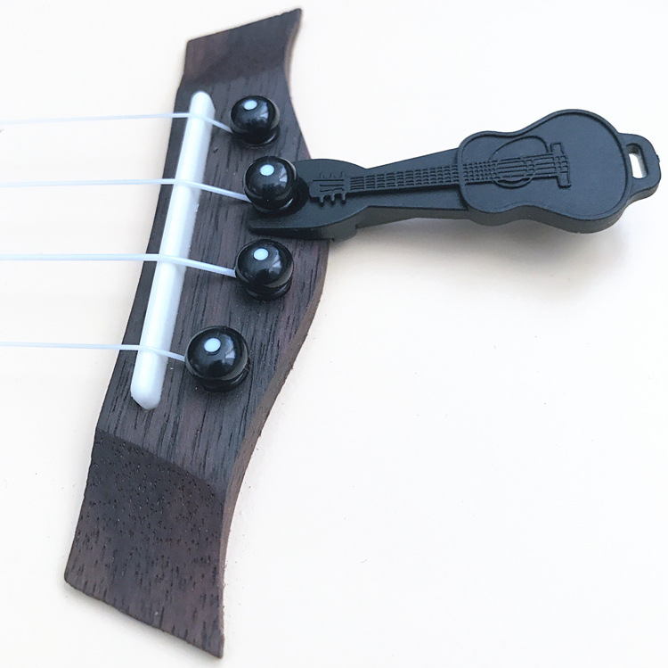 DỤNG CỤ GẨY CHỐT ĐÀN GUITAR - UKULELE
