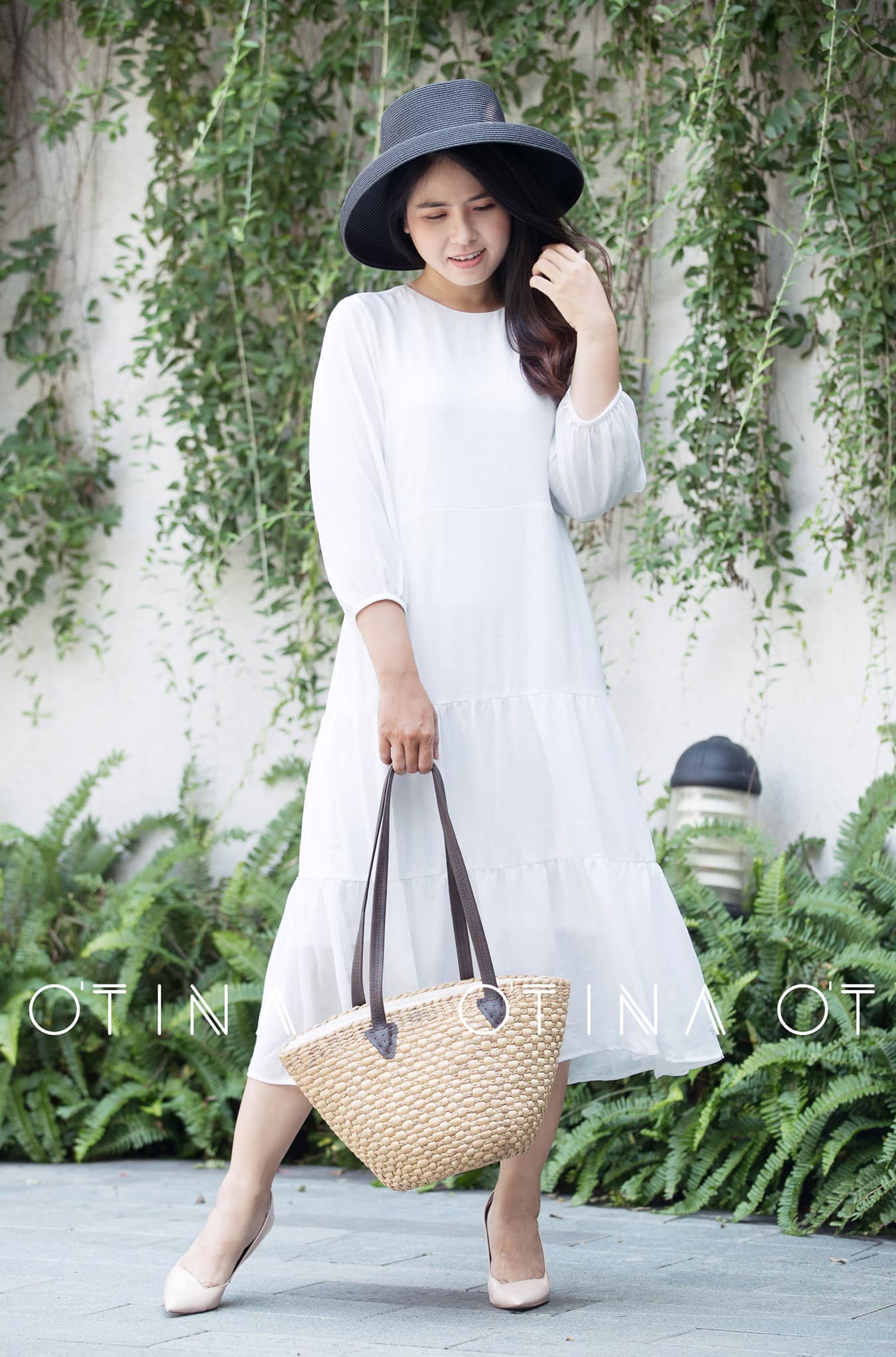 Đầm trắng tay dài babydoll