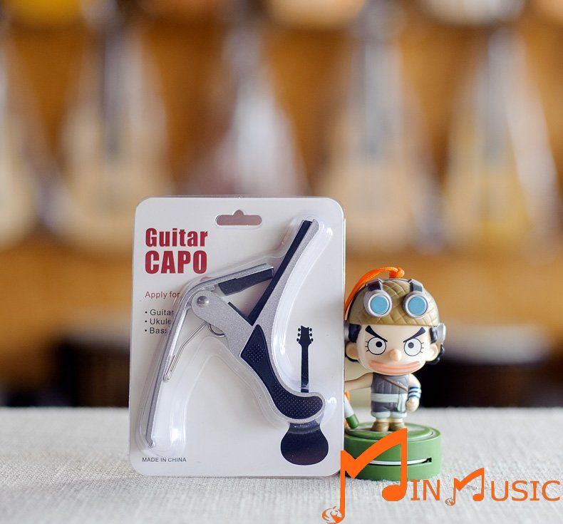 Capo guitar dùng cho đàn guitar acoustic /classic ( capo Kim Loại )