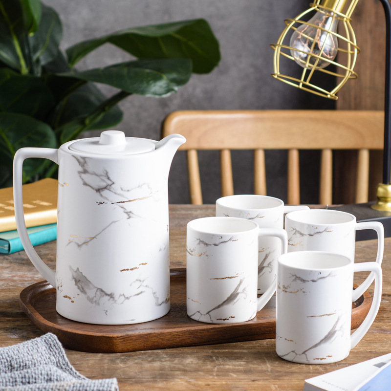 Bộ ấm trà gốm sứ hoa văn cổ điển
