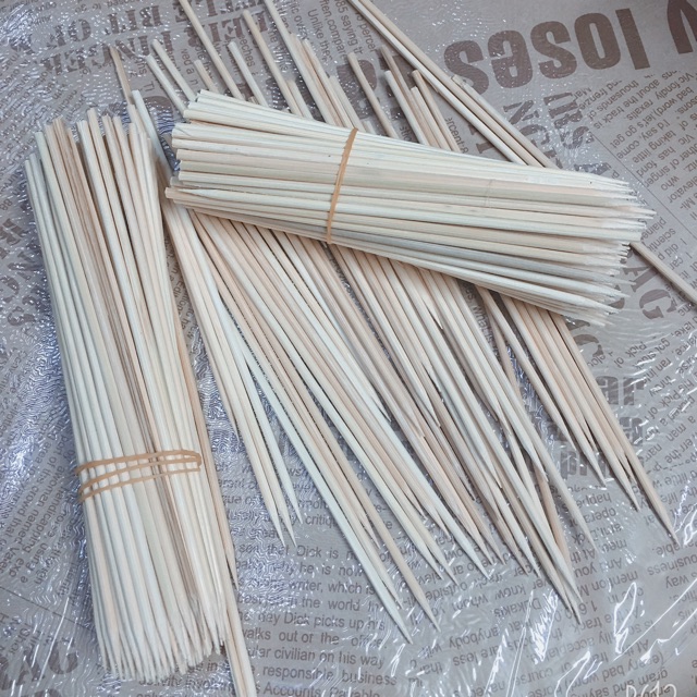 100g que xiên làm cành hoa sáp,hoa lụa,hoa giấy