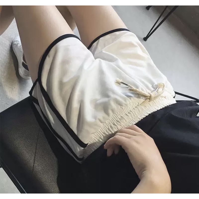 Quần thể thao nữ dạng short viền thời trang