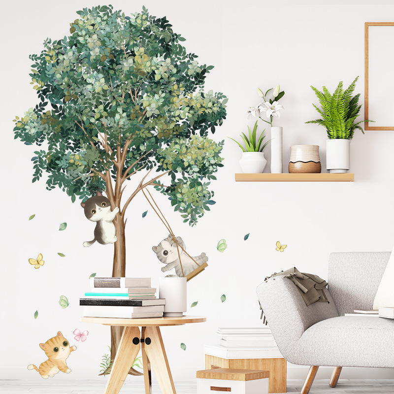 Decal dán tường cây xanh mèo xích đu
