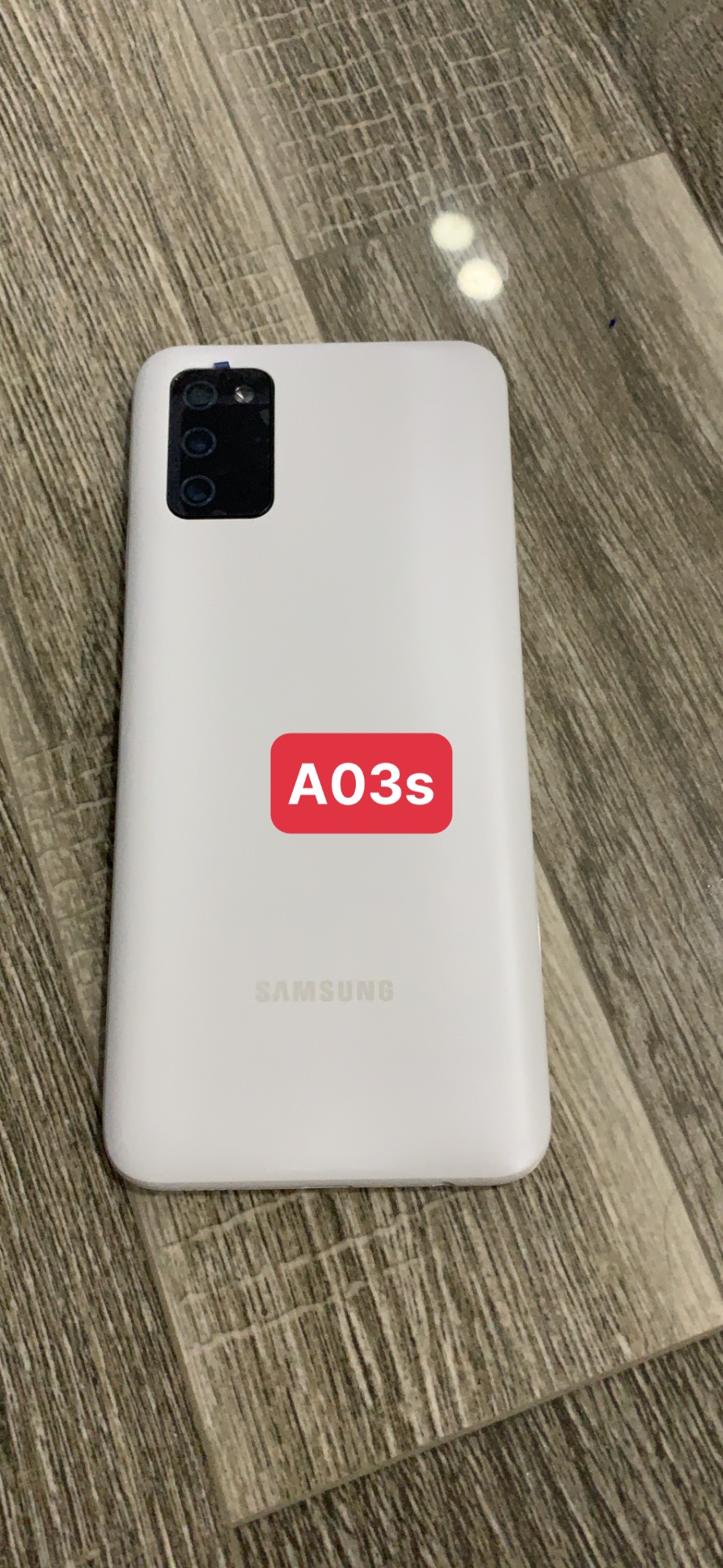 bộ vỏ samsung A03S (gồm,sườn,lưng,kính cam, nút bấn)