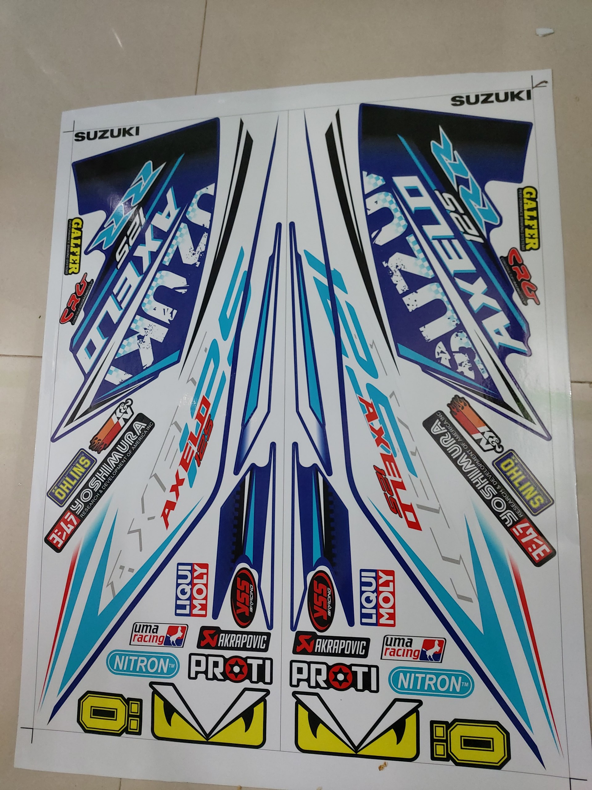 [HCM]Tem axelo suzuki 125 dán xe xanh trắng