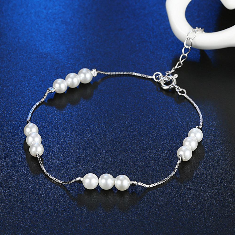 lắc bạc phối ngọc trai thật style cá tính