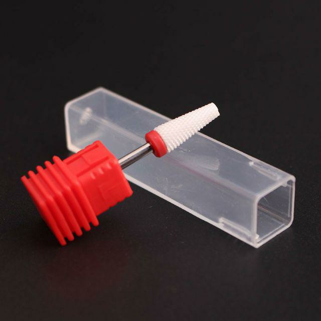 Đầu mài sứ dạng trụ vát.Giúp phá bột , phá đắp gel phá sơn