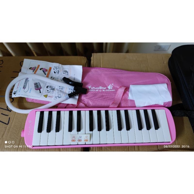Kèn melodion - melodica swan 32 phím âm thanh cực hay .