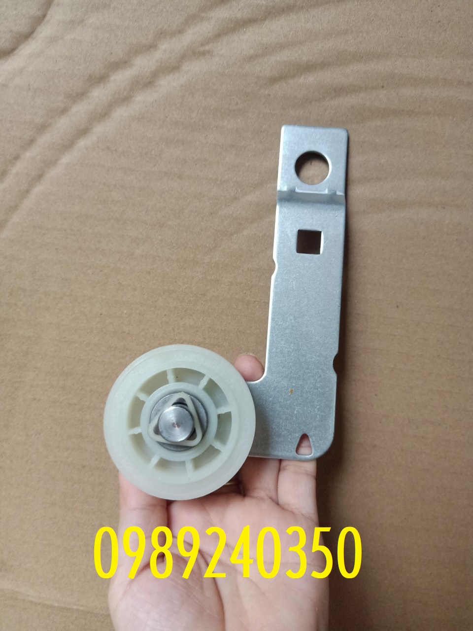 Bánh tỳ căng dây curoa máy sấy Whirlpool